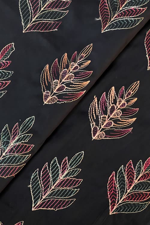 Black embroidered lawn fabric detail