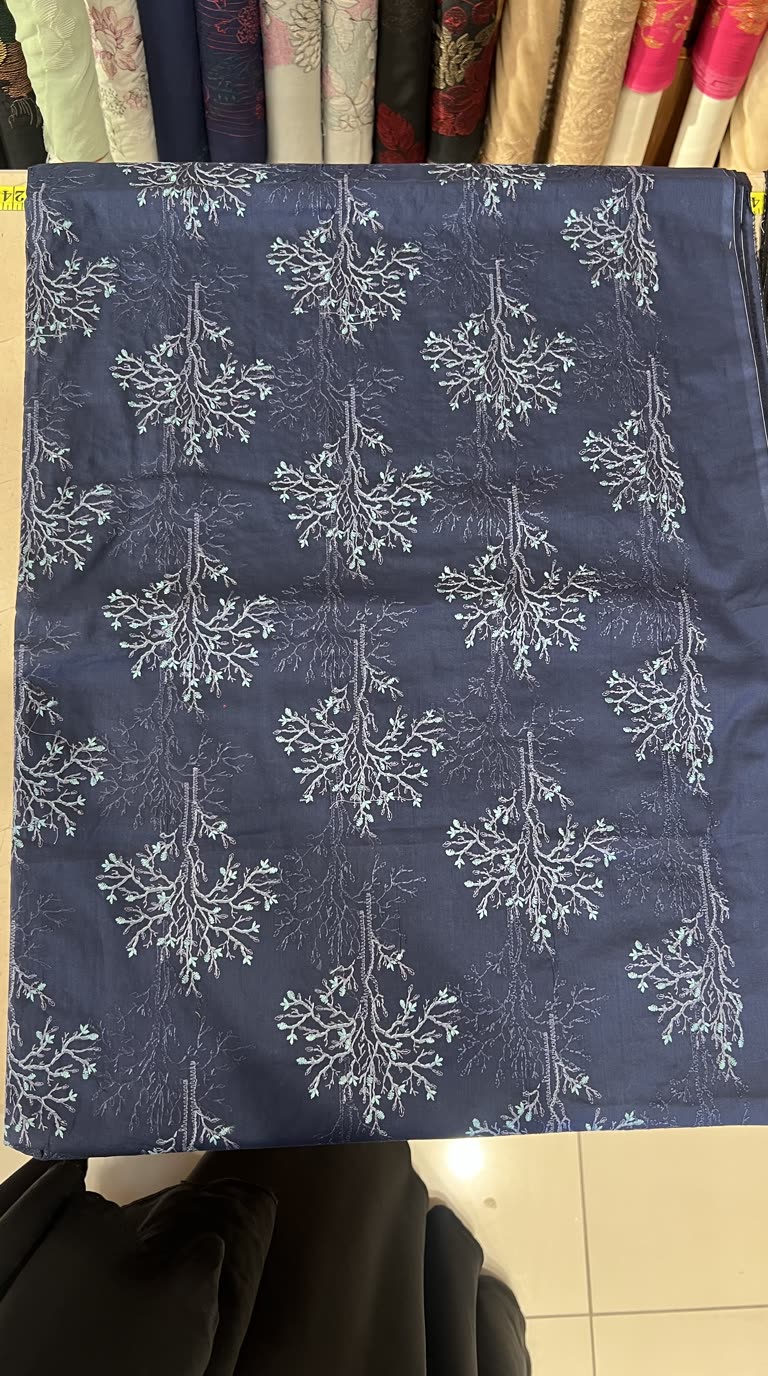Navy blue embroidered lawn fabric detail