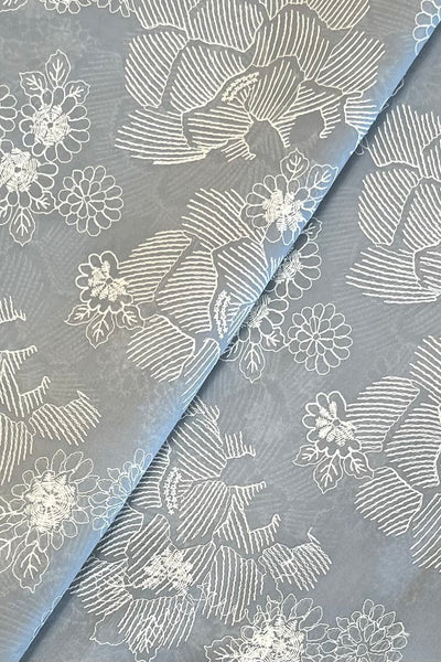 Grey embroidered lawn fabric detail