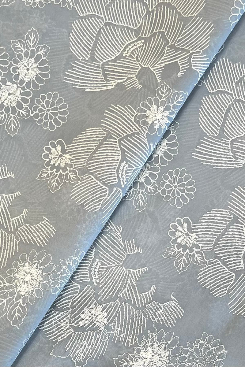 Grey embroidered lawn fabric detail