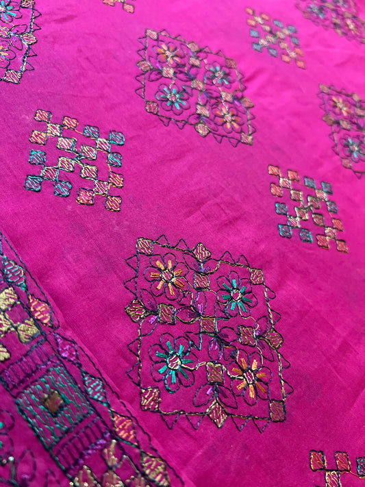 Fabareeze Fuchsia Pink Embroidered Lawn fabric close-up