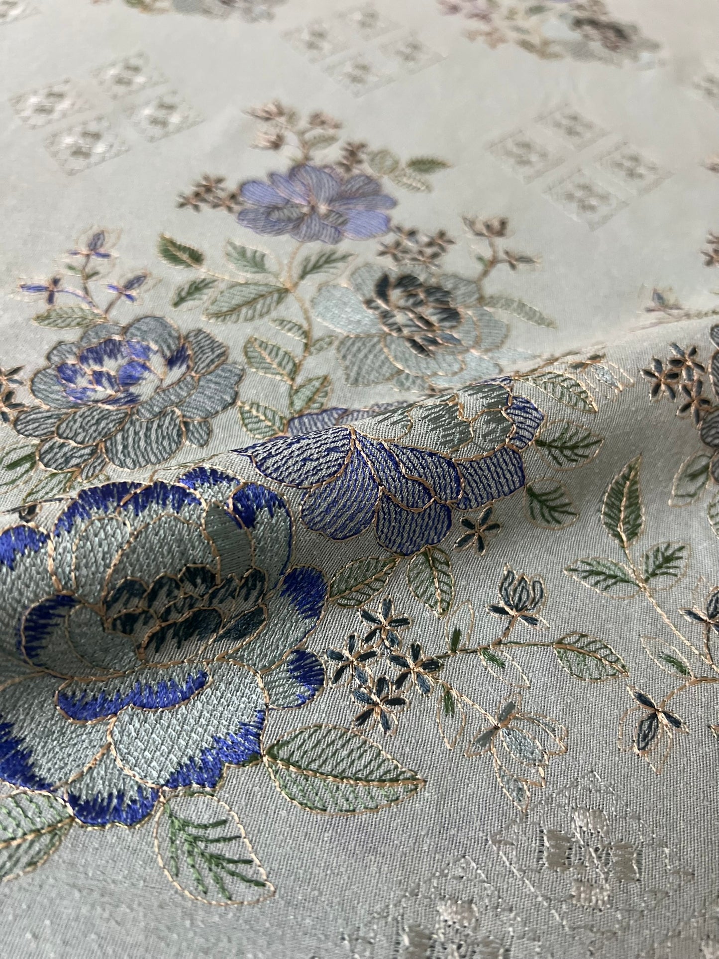 Fabareeze Ice Blue Embroidered Karandi fabric close-up