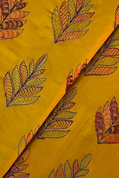 Mustard embroidered lawn fabric detail