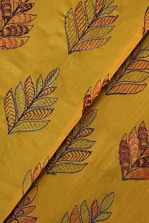 Mustard embroidered lawn fabric detail