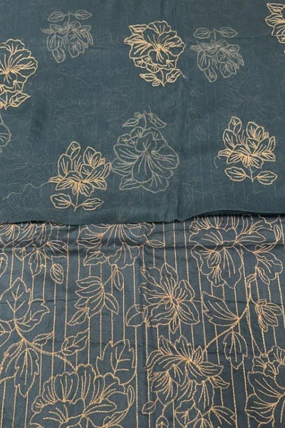 Teal green embroidered lawn fabric detail