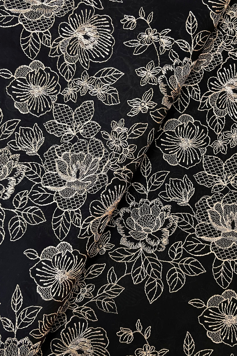 Black embroidered lawn fabric detail