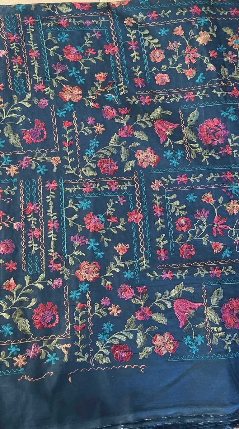 Teal blue embroidered lawn fabric detail
